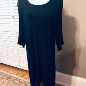 Coco Juan Black 1X knit long top with smocked sleeves.